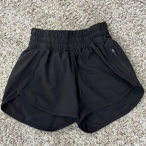 Lululemon black athletic shorts with built in brief.